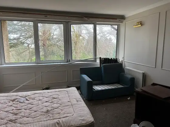 Abandoned guest bedroom at the abandoned Airth Castle and hotel complex.